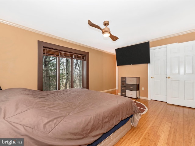 6518 Rimrock Rd, New Market, MD 21774 - bedroom featuring ornamental molding, wood finished floors, baseboards, and ceiling fan