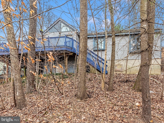 6518 Rimrock Rd, New Market, MD 21774 - back of property featuring a wooden deck and stairway