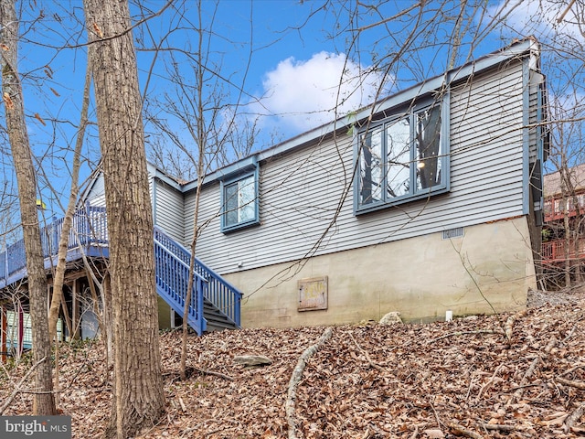 6518 Rimrock Rd, New Market, MD 21774 - view of property exterior featuring crawl space, stairs, and a wooden deck