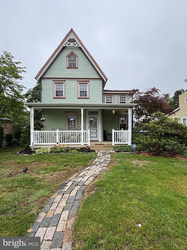 10 E Taunton Ave, Berlin, NJ 08009 - victorian house with covered porch and a front lawn