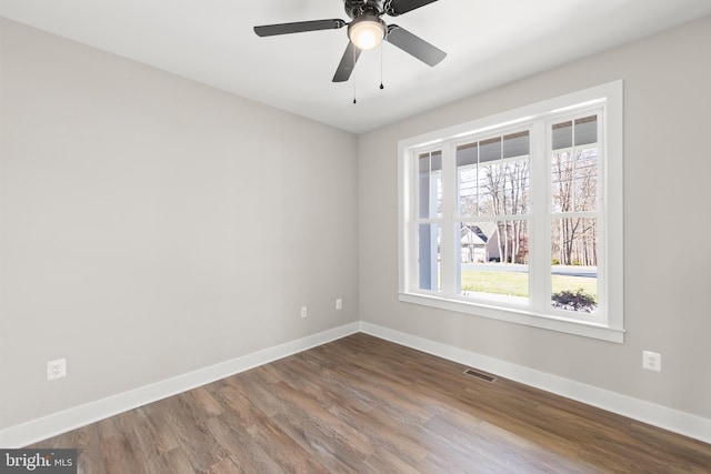 125 Lake Holiday Rd, Cross Junction, VA 22625 - unfurnished room featuring dark wood finished floors, baseboards, and ceiling fan