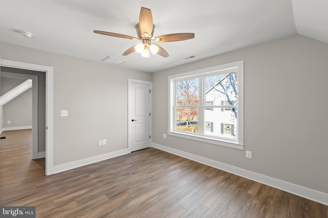125 Lake Holiday Rd, Cross Junction, VA 22625 - unfurnished bedroom with wood finished floors, baseboards, a ceiling fan, and vaulted ceiling