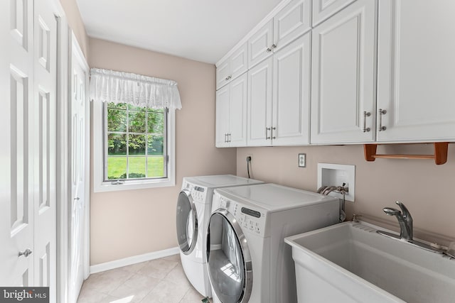 2 Raven Dr, Chadds Ford, PA 19317 - washroom with cabinet space, washer and dryer, baseboards, and light tile patterned floors