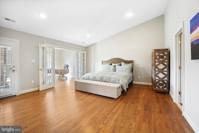 9630 Beman Woods Way, Potomac, MD 20854 - bedroom with wood finished floors, baseboards, french doors, and recessed lighting