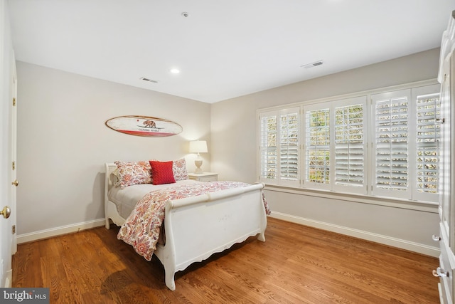 9630 Beman Woods Way, Potomac, MD 20854 - bedroom with baseboards, wood finished floors, and recessed lighting