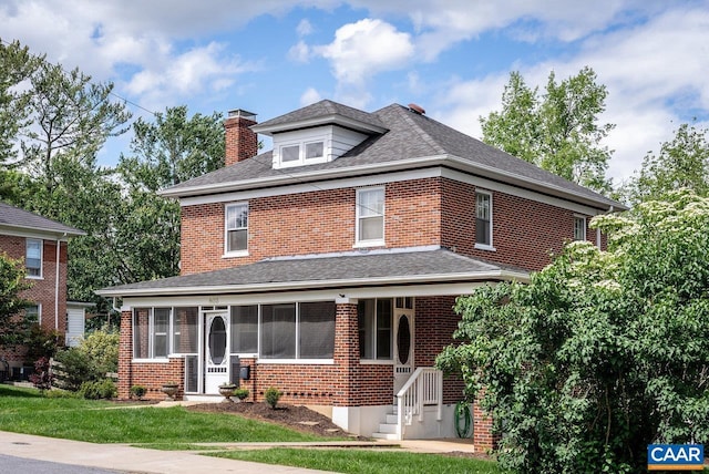 803 Alleghany Ave, Staunton, VA 24401 - traditional style home with brick siding, a chimney, a front lawn, and roof with shingles