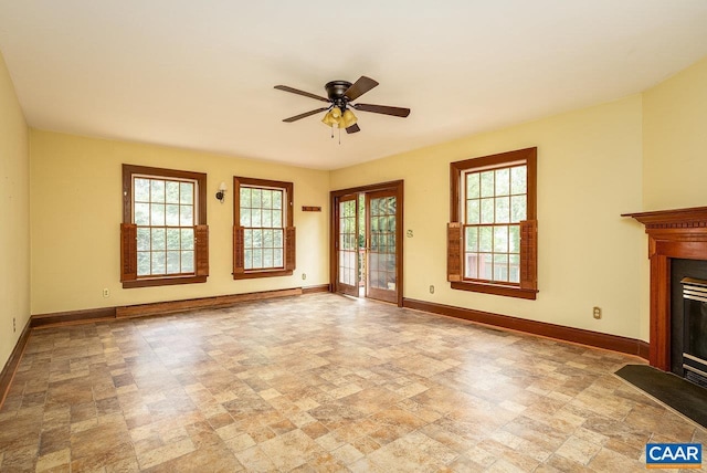 803 Alleghany Ave, Staunton, VA 24401 - unfurnished living room featuring healthy amount of natural light, baseboards, and a fireplace with flush hearth