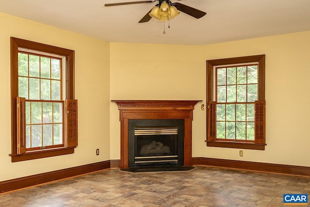 803 Alleghany Ave, Staunton, VA 24401 - unfurnished living room featuring a ceiling fan, baseboards, and a fireplace with flush hearth