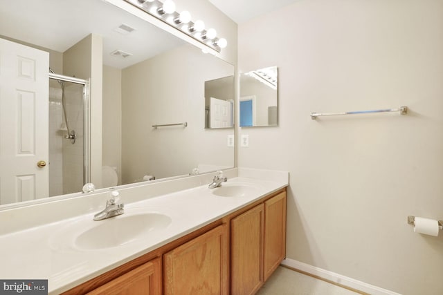20866 Rockingham Ter, Sterling, VA 20165 - full bath with double vanity, a tile shower, and toilet