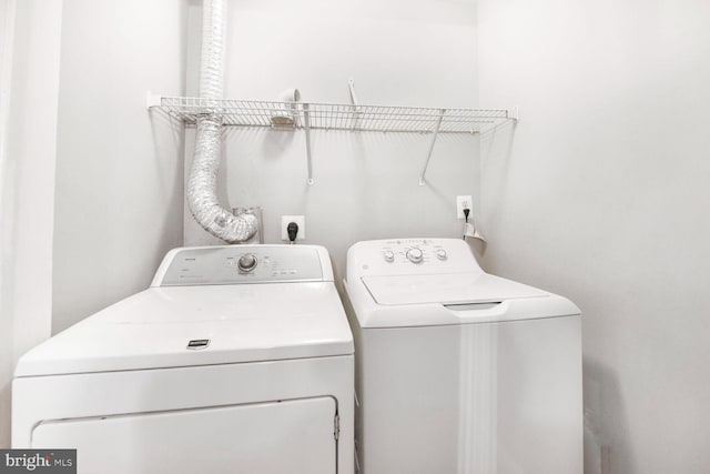 20866 Rockingham Ter, Sterling, VA 20165 - washroom with washing machine and dryer