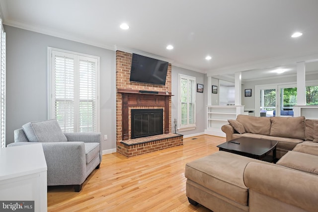 4 Old Elm Ct, Lutherville Timonium, MD 21093 - living area with crown molding, light wood-style floors, a fireplace, recessed lighting, and baseboards