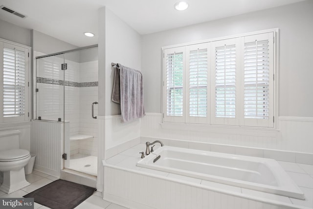 4 Old Elm Ct, Lutherville Timonium, MD 21093 - full bath featuring a garden tub, toilet, a wainscoted wall, a stall shower, and tile patterned flooring
