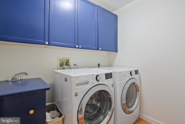 4 Old Elm Ct, Lutherville Timonium, MD 21093 - washroom featuring cabinet space, washer and clothes dryer, and baseboards