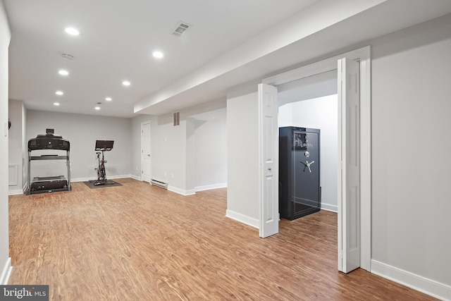 4 Old Elm Ct, Lutherville Timonium, MD 21093 - workout room with recessed lighting, light wood finished floors, baseboards, and a baseboard heating unit