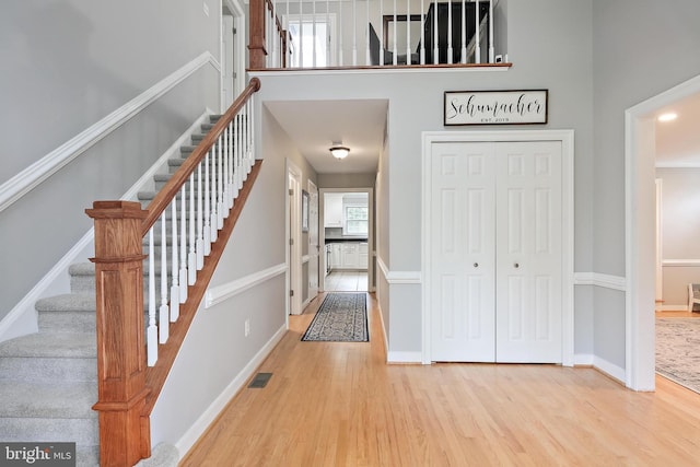 4 Old Elm Ct, Lutherville Timonium, MD 21093 - entryway with wood finished floors, stairs, and baseboards