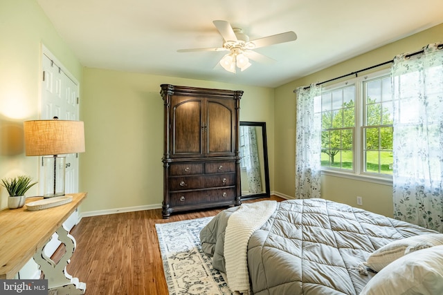 174 Greentree Dr, Bangor, PA 18013 - bedroom with baseboards, wood finished floors, and a ceiling fan