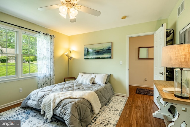 174 Greentree Dr, Bangor, PA 18013 - bedroom with wood finished floors, multiple windows, and baseboards