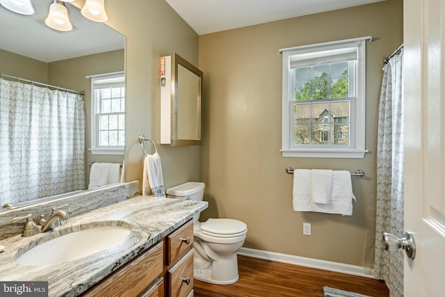 174 Greentree Dr, Bangor, PA 18013 - bathroom featuring toilet, wood finished floors, vanity, and baseboards