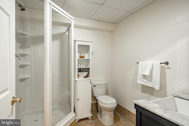 174 Greentree Dr, Bangor, PA 18013 - bathroom with toilet, vanity, a shower stall, a paneled ceiling, and tile patterned floors