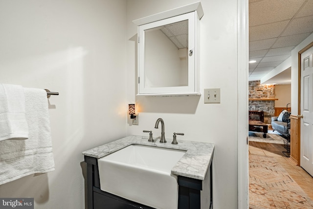 174 Greentree Dr, Bangor, PA 18013 - bathroom featuring vanity, a stone fireplace, and a drop ceiling
