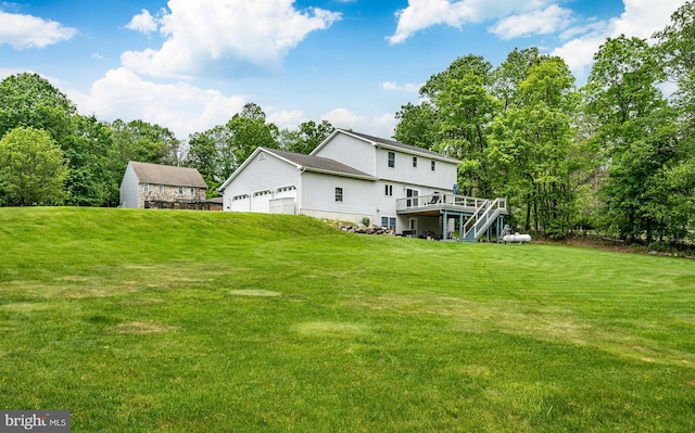 174 Greentree Dr, Bangor, PA 18013 - back of house featuring a wooden deck, a yard, and a garage
