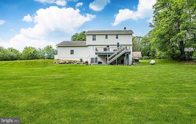 174 Greentree Dr, Bangor, PA 18013 - rear view of property with a wooden deck and a lawn