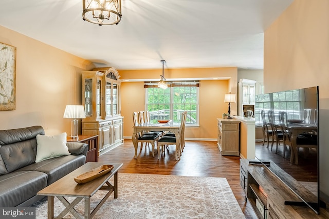174 Greentree Dr, Bangor, PA 18013 - living room featuring dark wood-style floors and a chandelier
