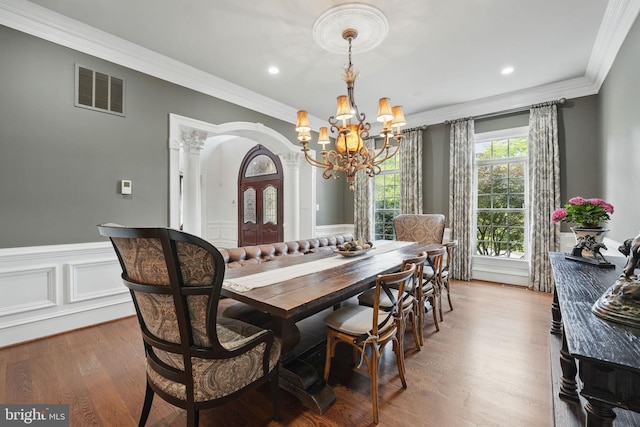 2555 Vale Ridge Ct, Oakton, VA 22124 - dining room with a chandelier, crown molding, wood finished floors, wainscoting, and recessed lighting