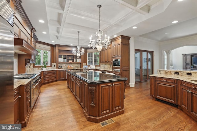 2555 Vale Ridge Ct, Oakton, VA 22124 - kitchen with light wood finished floors, recessed lighting, premium appliances, a sink, and a chandelier