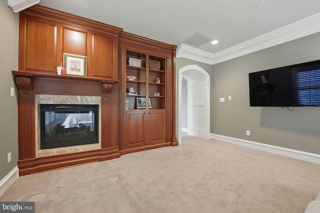 2555 Vale Ridge Ct, Oakton, VA 22124 - unfurnished living room featuring ornamental molding, arched walkways, a high end fireplace, carpet, and baseboards