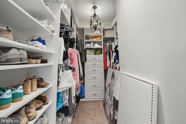 2555 Vale Ridge Ct, Oakton, VA 22124 - walk in closet featuring light colored carpet and a chandelier