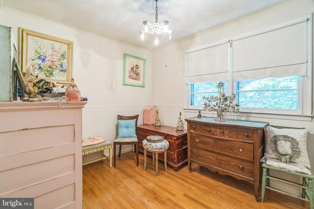 355 Arden, Gulph Mills, PA 19428 - living area with a chandelier, light wood-style flooring, and ornamental molding