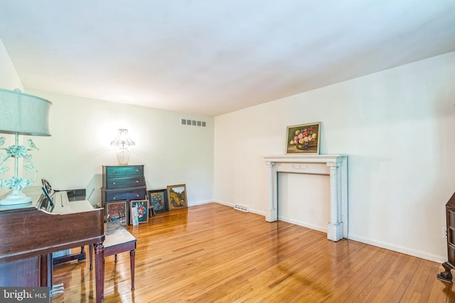 355 Arden, Gulph Mills, PA 19428 - living area featuring light wood-style floors and baseboards