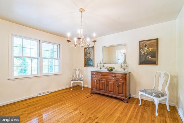 355 Arden, Gulph Mills, PA 19428 - dining space with a chandelier, light wood-type flooring, and baseboards