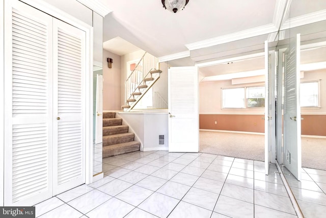 9511 Park St, Manassas, VA 20110 - unfurnished living room featuring stairs, baseboards, light carpet, crown molding, and light tile patterned floors