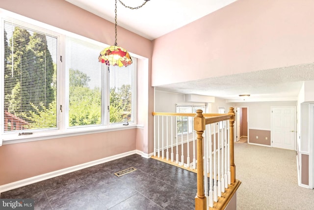 9511 Park St, Manassas, VA 20110 - corridor featuring baseboards and an upstairs landing