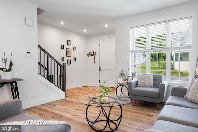 528 N Third St, Martinsburg, WV 25404 - living area featuring stairway, light wood-style floors, baseboards, and recessed lighting