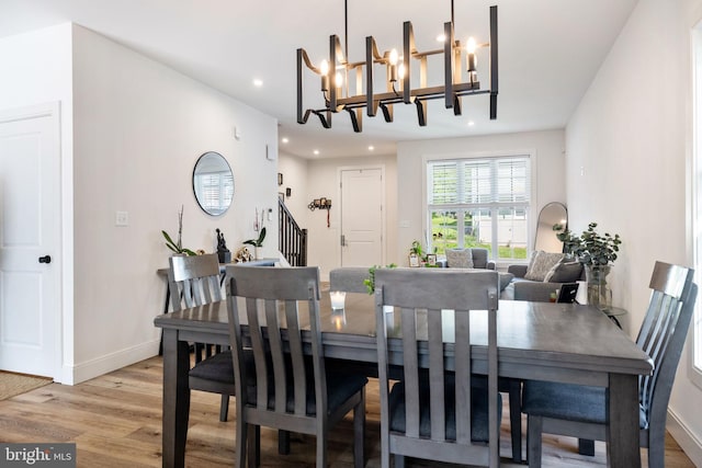 528 N Third St, Martinsburg, WV 25404 - dining room with light wood-style floors, recessed lighting, baseboards, stairway, and a chandelier