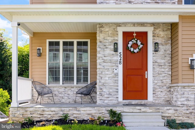528 N Third St, Martinsburg, WV 25404 - entrance to property featuring stone siding and a porch