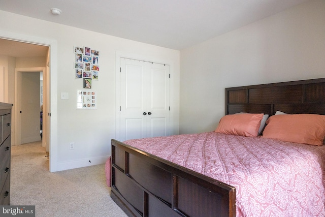 528 N Third St, Martinsburg, WV 25404 - bedroom featuring light carpet, a closet, and baseboards
