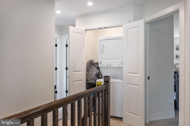 528 N Third St, Martinsburg, WV 25404 - corridor with stacked washing machine and dryer, an upstairs landing, and recessed lighting