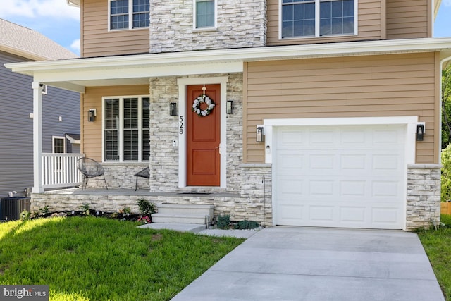 528 N Third St, Martinsburg, WV 25404 - entrance to property with stone siding, a garage, a porch, a lawn, and central air condition unit