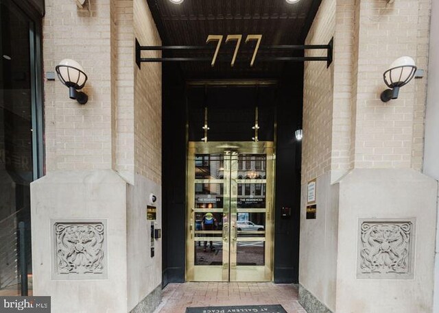 777 7th St NW Unit 913, Washington, DC 20001 - entrance to property with french doors and brick siding