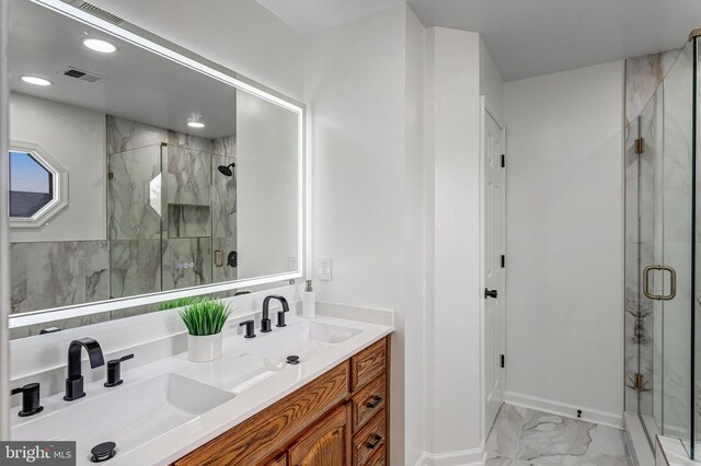 9509 Lincoln Ave, Manassas, VA 20110 - full bathroom featuring marble look tiles, a marble finish shower, double vanity, baseboards, and recessed lighting