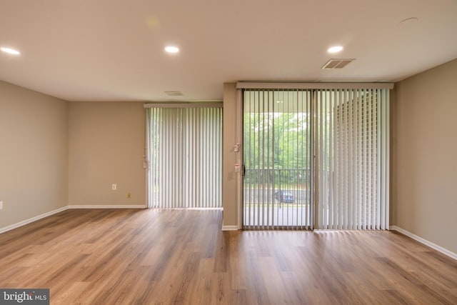 10249 Prince Pl Unit 31-203, Upper Marlboro, MD 20774 - empty room with baseboards, wood finished floors, and recessed lighting