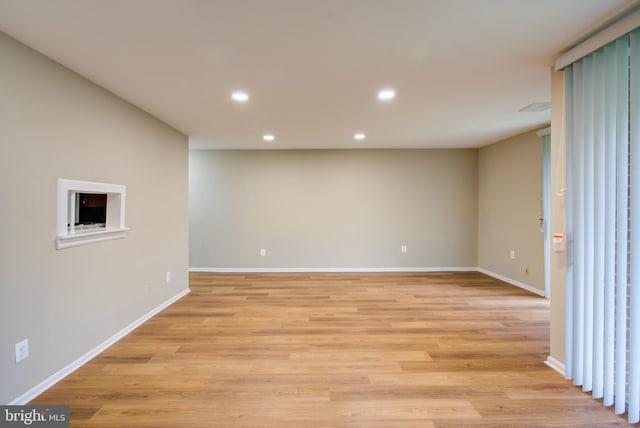 10249 Prince Pl Unit 31-203, Upper Marlboro, MD 20774 - spare room with recessed lighting, light wood-style flooring, and baseboards