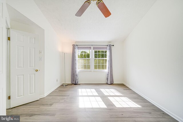 1434 Cellar Creek Way, Herndon, VA 20170 - spare room featuring ceiling fan, wood finished floors, baseboards, and a textured ceiling