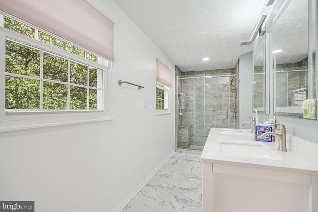 1434 Cellar Creek Way, Herndon, VA 20170 - full bathroom with marble finish floors, a marble finish shower, baseboards, double vanity, and a textured ceiling