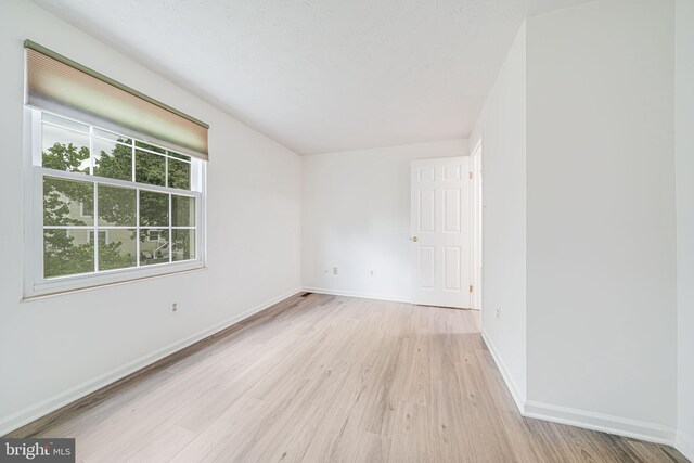 1434 Cellar Creek Way, Herndon, VA 20170 - unfurnished room featuring light wood finished floors and baseboards