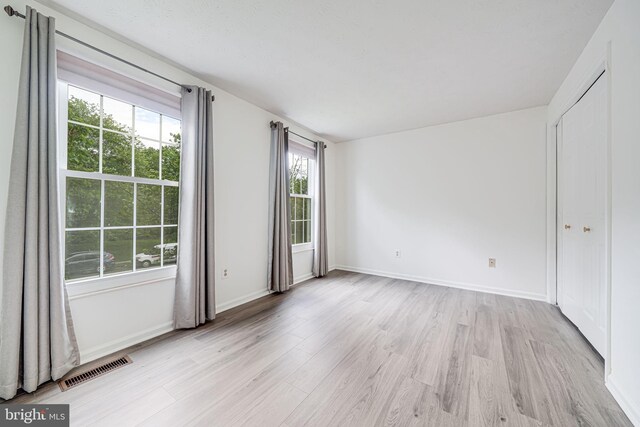 1434 Cellar Creek Way, Herndon, VA 20170 - unfurnished room with light wood-style floors and baseboards